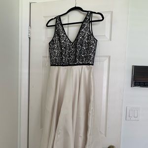 Midlength Black and white dress- worn once for prom, size 2 but fits medium